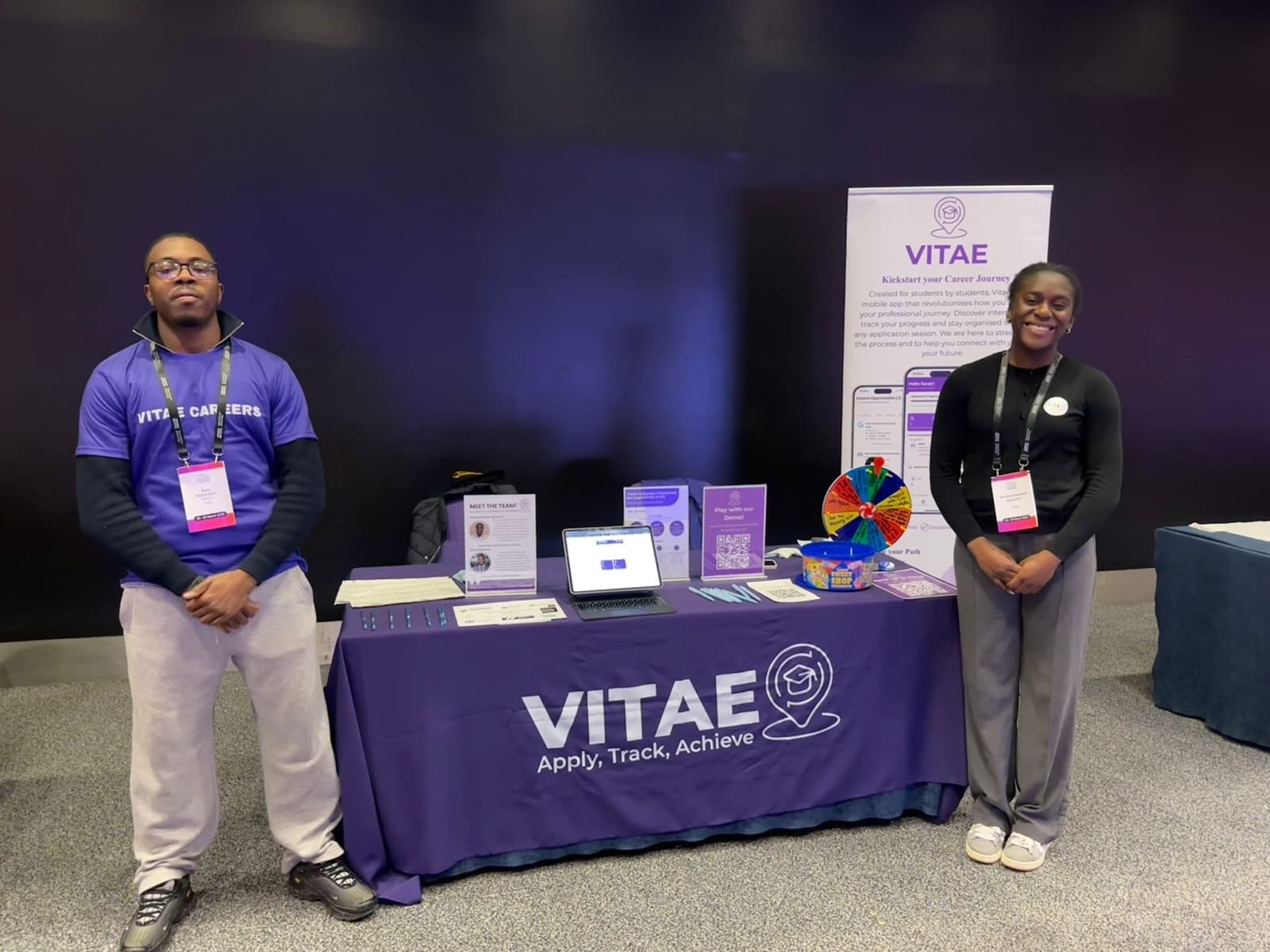 Two members of the Vitae team standing either side of the Vitae stand at MLSFF 2026